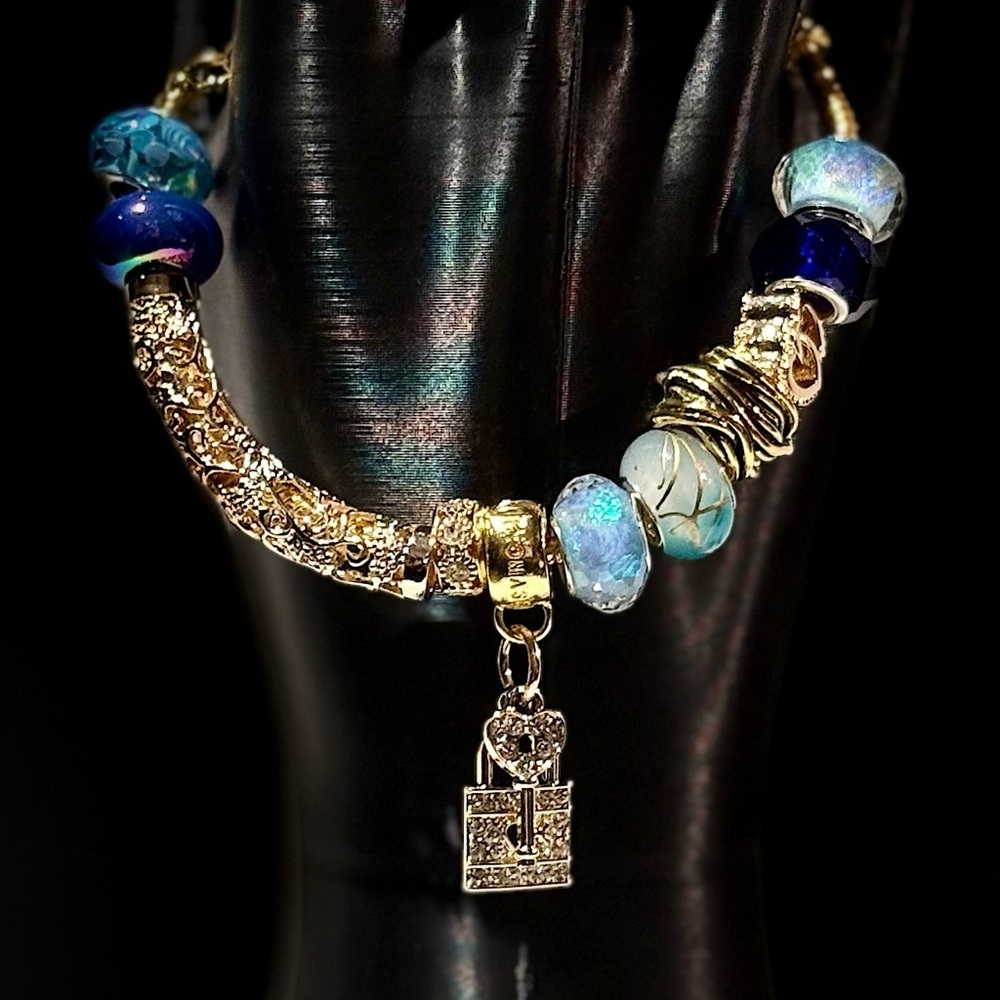 Elegant Gold and Blue Charm Bracelet